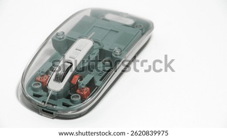 Computer transparent mouse isolated on white background. Selective focus