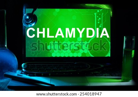 Computer with words  Chlamydia. Test tubes, stethoscope and thermometer. 