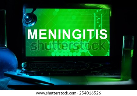 Computer with words  Meningitis. Test tubes, stethoscope and thermometer. 