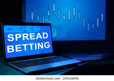 Computer With Words Spread Betting. Trading Concept.