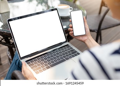 Computer,cell Phone Mockup Image Blank Screen With White Background For Advertising Text,hand Woman Using Laptop Texting Mobile Contact Business Search Information On Desk In Cafe.marketing,design