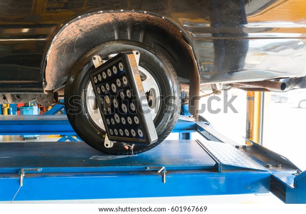 Computerized alignment\
car tire machine\
clamp