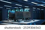 Computers in data center used for managing equipment rackmounts energy consumption. Panning shot of PC monitors in high tech establishment used for automation and monitoring processes in server hub