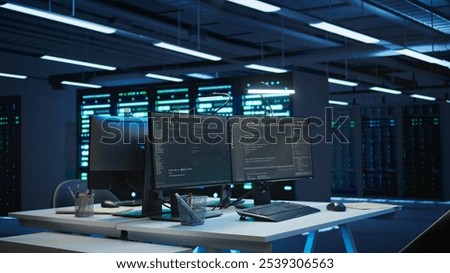 Computers in data center used for managing equipment rackmounts energy consumption. Panning shot of PC monitors in high tech establishment used for automation and monitoring processes in server hub