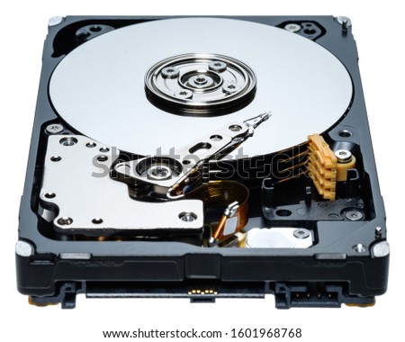 a computer's hard disk hdd data storage drive without shield isolated  in white background show magnetic disc and electronic part inside