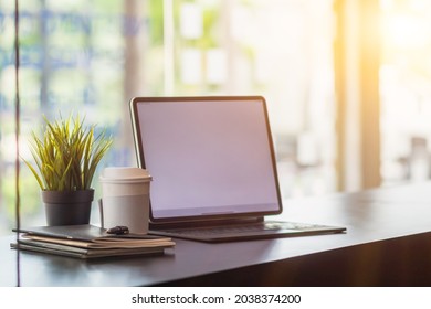 Computers on the desks are set up in the office to be available at all times through the corporate network and the Internet network for the convenience of contacting and collaborating with others. - Shutterstock ID 2038374200