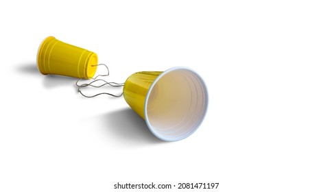 Comunication Yellow Plastic cup with string isolated on white background	