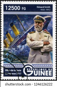 CONAKRY, GUINEA - MAY 22, 2017: A Stamp Printed In Republic Of Guinea Shows Titanic And Edward Smith (1850-1912) Captain Of RMS Titanic, 2017 