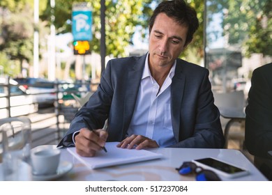 Life Essays Concentrate Middle Age Businessman Portrait Writing An Essay Outdoors In Rome Italy Essay On Effective Communication also Toefl Essay Topic Happy Middle Age Businessman Portrait Drinking Stock Photo Royalty The Features Of A Compare And Contrast Essay Include