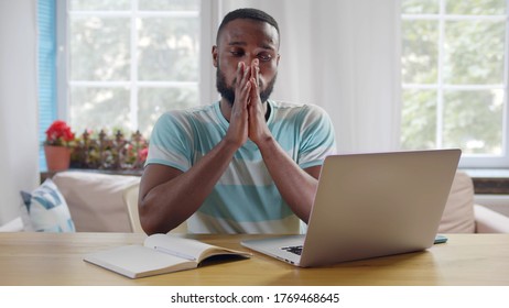 Concentrated Afro-american Guy Thinking About Solvation Of The Financial Problem Looking At Laptop Screen