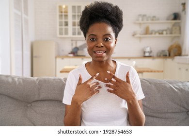 Concentrated Black Girl Talking In Webinar, Communicating Use Videoconference App. Smiling Young African Woman Vlogger Influencer Make Video Conference Call, Looking At Webcam, Recording Vlog At Home.