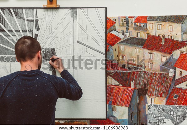 experimental facility with artist drawing dog