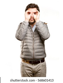 Concentrated man doing an observation gesture