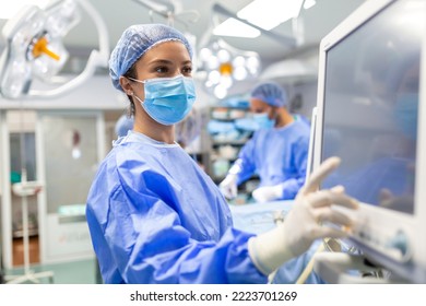 Concentrated Surgical team operating a patient in an operation theater. Well-trained anesthesiologist with years of training with complex machines follows the patient throughout the surgery. - Powered by Shutterstock