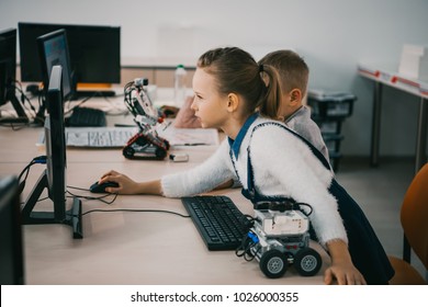 Concentrated Teen Child Programming Robot At Class, Stem Education Concept