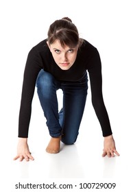 Concentrated Woman Is Getting Ready To Run. Isolated On A White Background