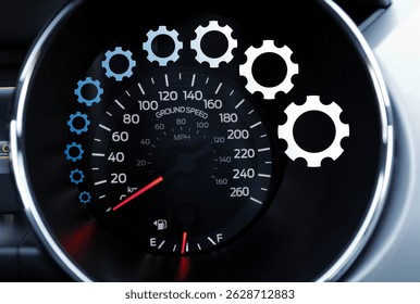 A concentric pattern of gears changing color from blue to white around the numbers on the speedometer scale of the car dashboard