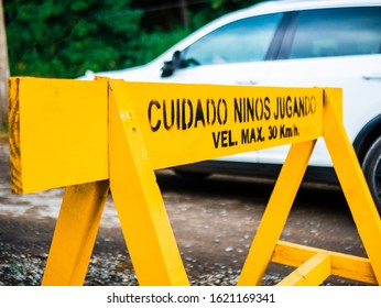 Concepcion, Chile - January 18 2020: Pingueral Yellow Signs That Ask To Drivers To Please Slow Down. 