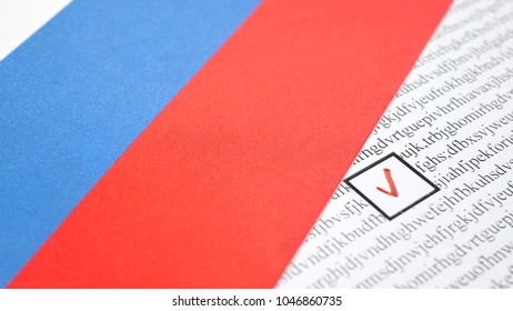 Concept Of The 2018 Russian Presidential Election On 18 March 2018. Ballot And Red Pencil With National Flag Of Russia