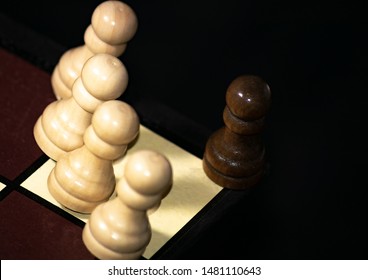 Concept About Racial Violence And Discrimination With Chess Pieces