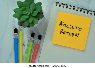 Concept of Absolute Return write on sticky notes isolated on Wooden Table.