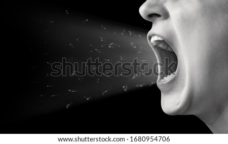 Concept of anger. Portrait of a screaming woman with sound wave from her mouth.  Black and white image.