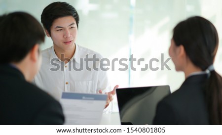 Concept of applying for work, Interviewing job seekers presenting their resume for executives to consider.