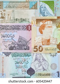 Concept: Arab Spring. Muammar Gaddafi On Libya Dinar Banknote Close Up