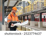 Concept architects, Locomotive engineer holding blueprints with documents on construction site. 2-Direction Guideway Beams, Propose Rail Level