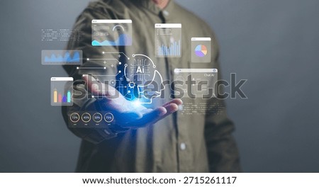 concept of artificial intelligence and data analysis, businessman demonstrates virtual interface of graph and holographic AI brain on hand, conveying future technology and intelligent work assistant.