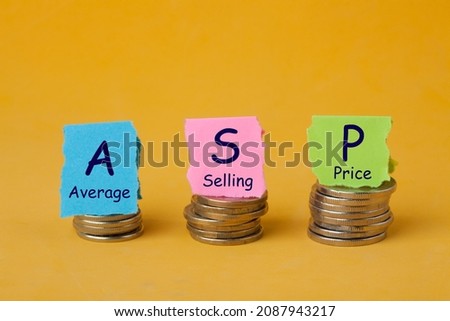 Concept of ASP or Average Selling Price and stacked coins. 