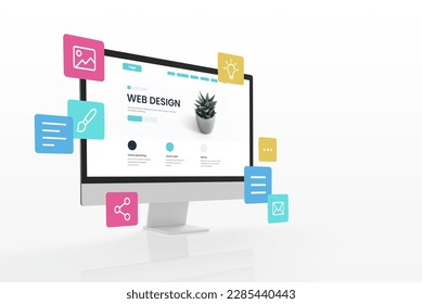 Concept of assembling a web page from modules that fly around the display. The web design studio concept page is on the display - Shutterstock ID 2285440443