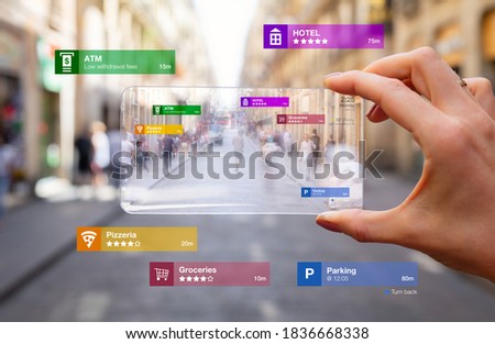 Concept of augmented reality technology being used on futuristic tech gadget