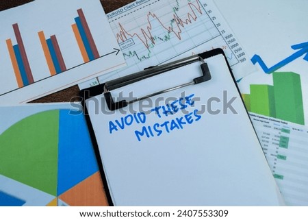 Concept of Avoid These Mistakes write on paperwork isolated on wooden background.
