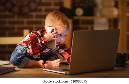 concept of baby boy working on a computer and talking on the phone
 - Powered by Shutterstock