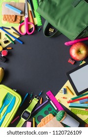 Concept Back To School Apple Backpack Stationery On Black Background. Top View Flat Lay