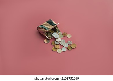 Concept Background Of Ruble Coins Spilled Out Of Small Purse On Dark Pink Background