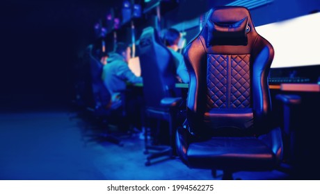 Concept banner background championship cyber sport arena. Professional gamers armchair cafe room with computer game blue color.