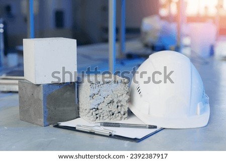 Similar – Image, Stock Photo Test of cement compressive strength according to standards, properties of engineered composite materials and cement strength are tested in the physics laboratory.