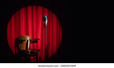 Concept banner standup comedian show. Old microphone and armchair on theater stage on red curtains background. - Powered by Shutterstock