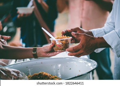 The concept of begging food : Hands of the poor are waiting for food donations to alleviate hunger - Shutterstock ID 1822646411