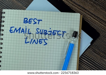 Concept of Best Email Subject Lines write on a book isolated on Wooden Table.