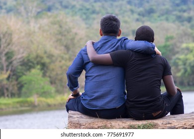 Guys hugging two Two Caucasian
