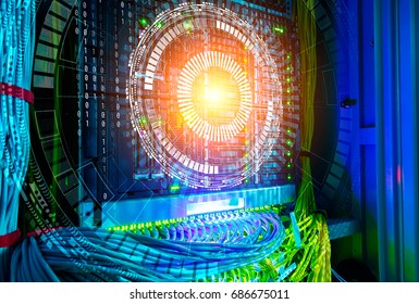 Concept of big data. Hologram technology background over mainframe with cables in Network switch and UTP ethernet cables close-up.