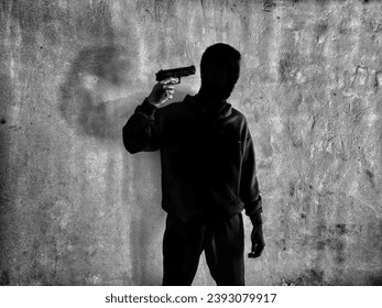 concept of black man wanting to kill himself with a gun. bullying, depression, frustration, suicide. focus on people