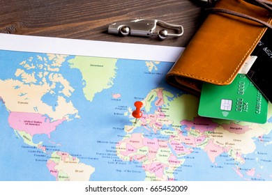 concept booking travel insurance on wooden background - Shutterstock ID 665452009