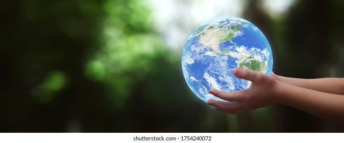 concept- boy holding planet earth in his hands- elements of this image furnished by NASA - Powered by Shutterstock