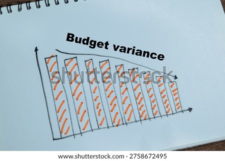 Concept of budget variance write on book isolated on Wooden Table.