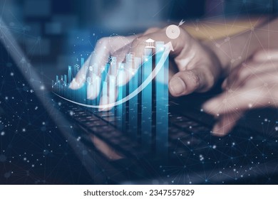 Concept business Growing graph, chart with company Progress and growth, Economic Growth, Business people check and Analytic data of Annual Economic Growth Data. Digital screen touch. - Shutterstock ID 2347557829