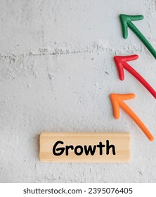 Concept of business growth with arrows - Shutterstock ID 2395076405